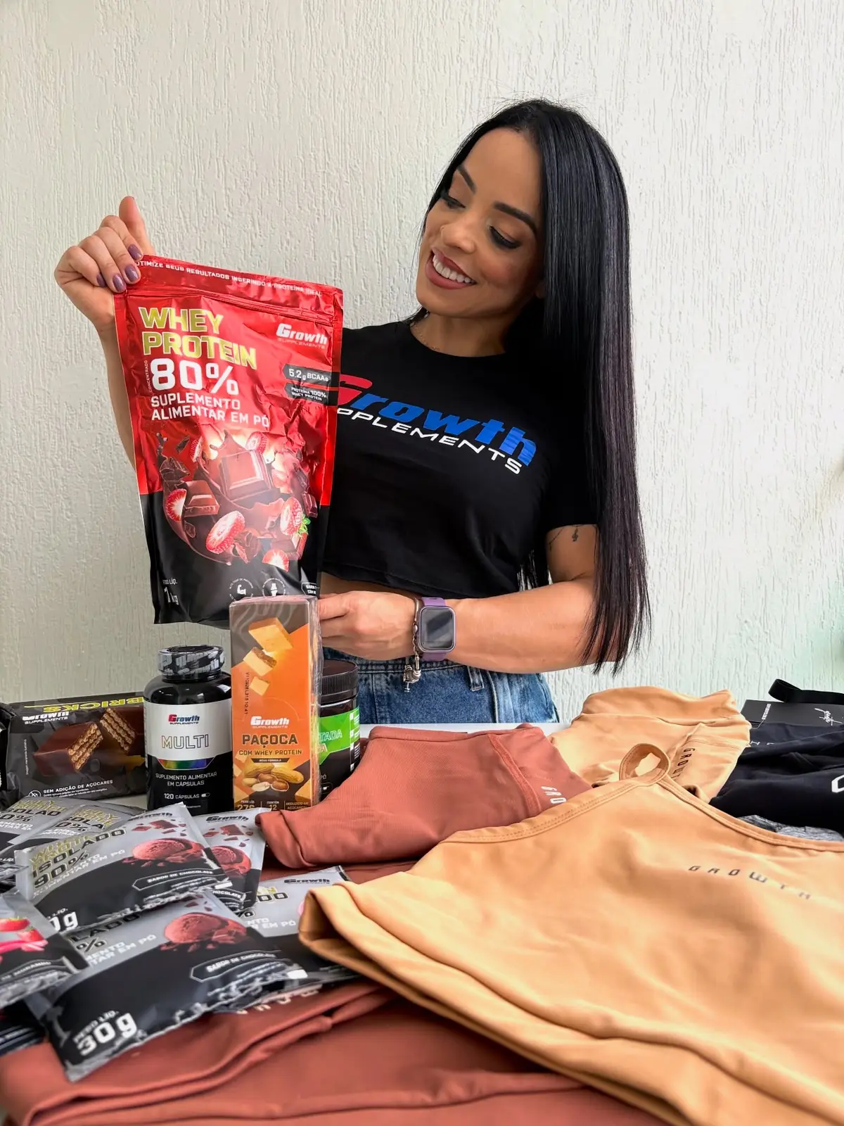 Foto real da cliente Marina com Whey Growth 80% + Paçoca + Multi